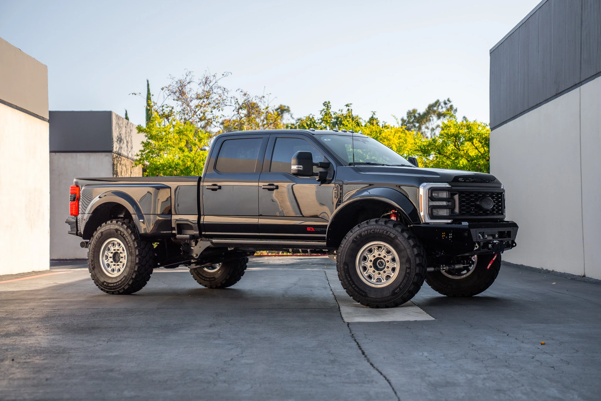 A dark-finish crew-cab Truman.